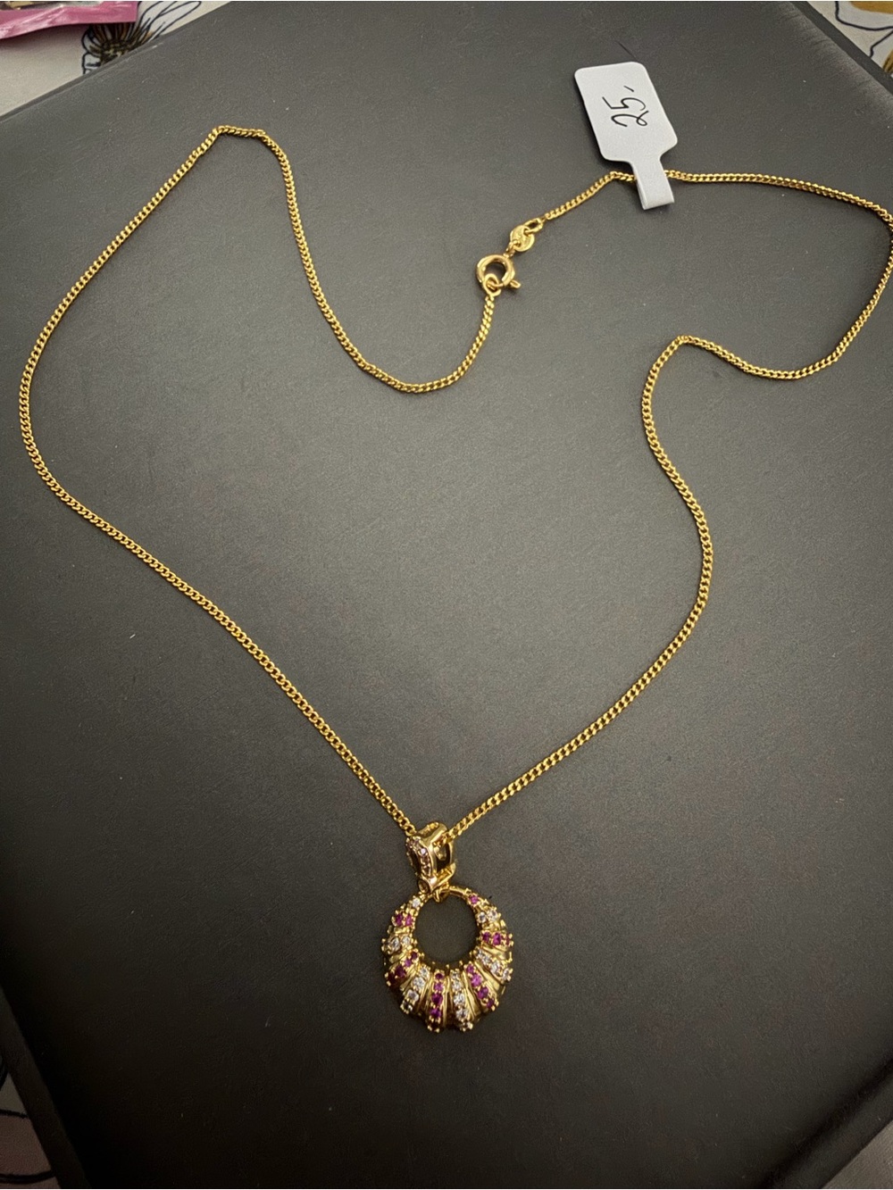 Gold-Tone Circular Pendant Necklace with Pink Accent Stones